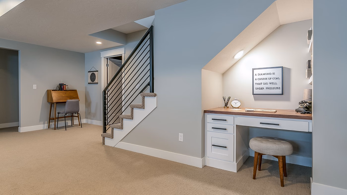 Basement home office with built-in desk